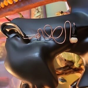 Handcrafted copper earrings with bone and crystal bead.